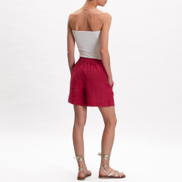 Tensione in- Shorts in lino con coulisse - lampone